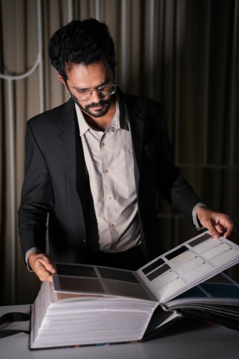 Professional executive portrait of Mohammed Saleel in a modern architectural setting